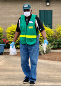 A volunteer caring small bags