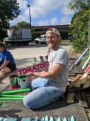 Volunteers making signs for a garden